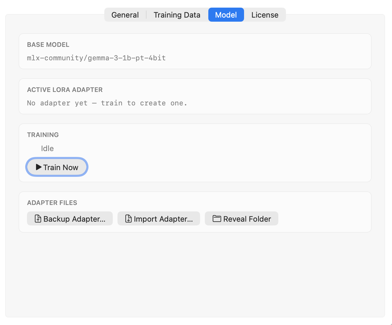 TypeTab Settings on the Model tab: the Gemma 3 base model name, an 'Active LoRA Adapter' status reading 'No adapter yet — train to create one', a highlighted 'Train Now' button under the Training heading, and 'Backup Adapter', 'Import Adapter' and 'Reveal Folder' buttons in an Adapter Files row.